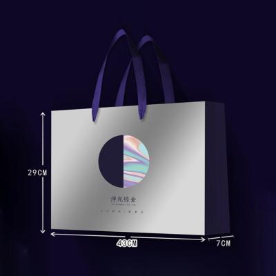 China Recyclable Luxury Black Kraft Paper Bags Printed Logo Custom Packaging Bags Clothing Shopping Gift Jewelry for sale