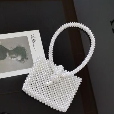 China Luxury Fashion Beach Summer Beach Girls Stone Pearl Shoulder Bag Women Tote Purse Bucket Stone Handbag Wedding Party Handbag for sale