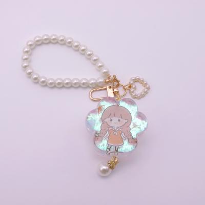 China Custom Car Pendant Decoration Epoxy Resin Ornaments Crystal Cute Cat's Claw Pearl Key Chain Bag Gift for sale