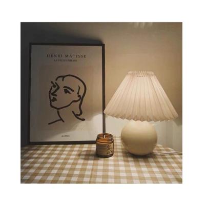 China Nordic Minimalist Bedroom Reading Table Lamp Wedding Bedside Lamp Ceramic Pleated Luxury Led Night Light For Decorative for sale