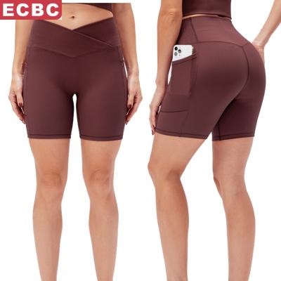 China 2022 New Spring Women's Breathable Yoga Shorts Cross Waist Tight Fitness Pants Pockets High Waist Hip Lifting Sports Running Shorts for sale