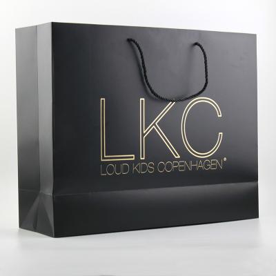 China BSCI Security, FSC Luxury Black Paper Bag With Hot Stamping Logo for sale