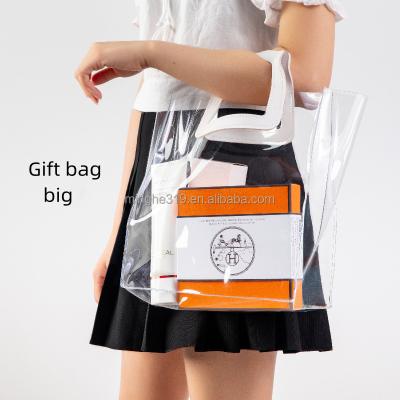 China Shock Resistance Custom Logo Holographic Pvc Tote Plastic Bag Shopping Bag Gift Bag for sale