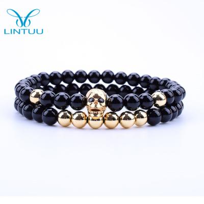 China FASHIONABLE Hot Selling 2pcs /set Black Onyx Beads Bracelet With Gold Skull Head for sale