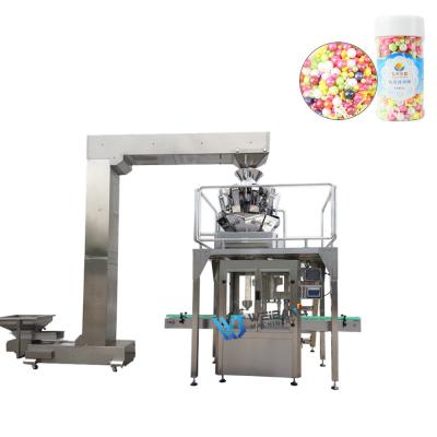 China Automatic Food Granule Filling Machine Capping Machine with 10 Heads Weigher and Filler for Glass Jar for sale