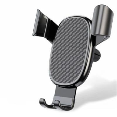 China Auto Gravity Feeling Car Accessories Hot Sale Car Phone Holder Smart Wireless Charger Cell Car Phone Holder for sale