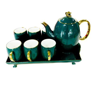 China Viable precious green color ceramic teapot set full gold rim outside cup with dolphin spout which is all matched with modern life for sale