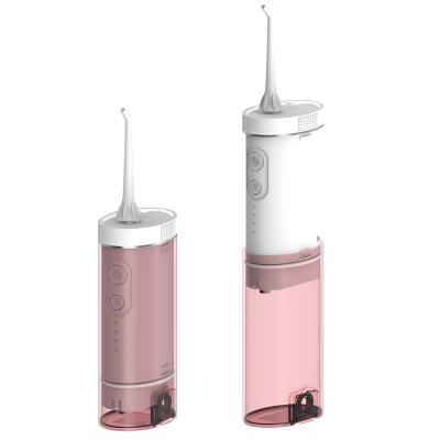 China Teeth and Clean Massage Gum Home and Travel Portable Dental Flosser 180ml with 4 Modes USB Rechargeable Oral Irrigator Working Pink for sale