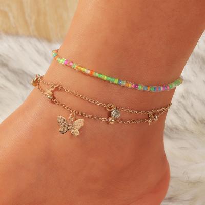 China Fashion Friendly Material Gold Filled Plating Cuban Chain Butterfly Pendant Rice Beads Anklet For Women for sale