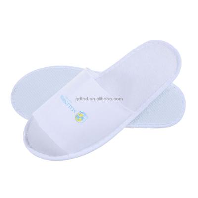 China Narrow Toe Nonwoven Fabric Disposable Hotel Slipper Cheap Open Toe Slipper For Hotel Guest Bedroom for sale