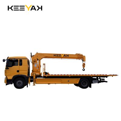 China SINOTRUK HOWO Flatbed 4x2 Tow Truck Wrecker Truck With Crane 5 Ton for sale