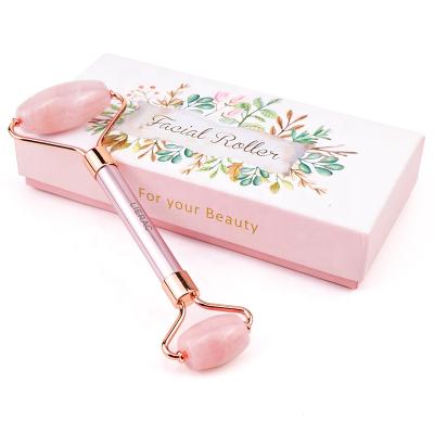 China Manufacturer Lowest Price Handmade Natural Skin Face Massage Roller Anti Aging Rose Quartz Jade Roller Flower Box Metal for sale