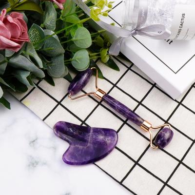 China Best Selling Manufacturer Handheld Body Massage Anti Aging Jade Stone Guasha Natural Amethyst Jade Roller Purple for sale