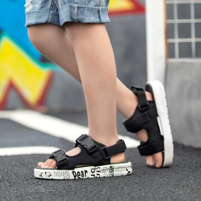 China High Quality Lightweight Fashion Kids Sandals and Shoes For Boys One Piece Open Toe Kids Beach Slipper Kids Slides Shoes for sale