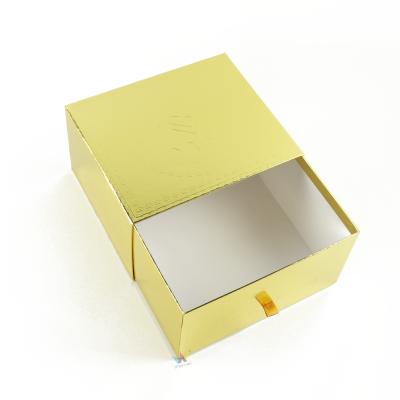 China Recycled Materials Shining Gold Drawer Boxes With Sliver Custom Embossed Logo Gold Gift Box for sale