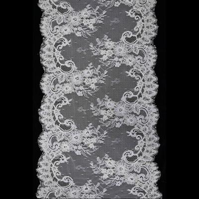 China Latest Style Soft Exquisite Design Ivory White Beaded French Lace Fabrics For Sewing for sale