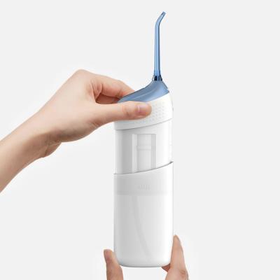 China ABS 360 Rotating USB Waterproof Portable Smart Dental Water Flosser IPX7 150ml Small Degree Mini Spout Irrigator for sale