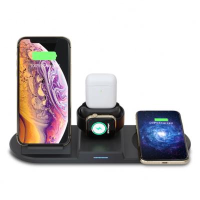 China For iphon New Arrival Mobile Phone Charging Stand 4 in 1 Foldable Fast Charging Stand 15W Qi Wireless Charger Dock For iPhone Airpods Watch for sale