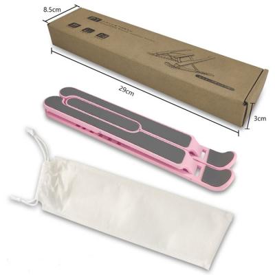 China Ergonomic color adjustable plastic foldable pink size laptop adhustable folding stand (waist) for sale