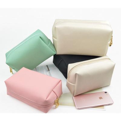 China Cosmetics Wholesale Customized Logo PU Ladies Hand Portable Cosmetics Bag Waterproof Travel Wash Bag Travel Cute Cosmetic Storage Bag for sale