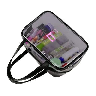 China Custom Clear PVC Travel Transparent Clear PVC Cosmetic Bag With Handle for sale