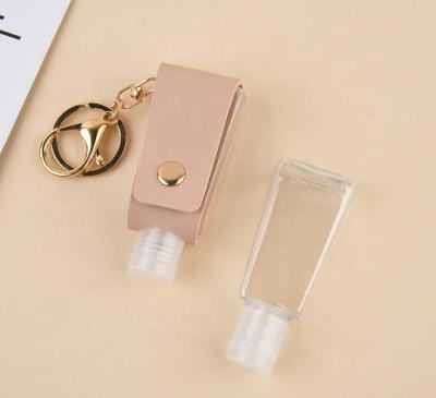 China Wholesale Custom Neoprene Leather Mini Tassels 30Ml Gel Travel Bottle Key Chain Portable Hand Sanitizer Holder for sale