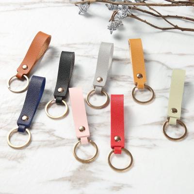 China Cheap custom embossed animal leather key chain factory leather key chains for sale