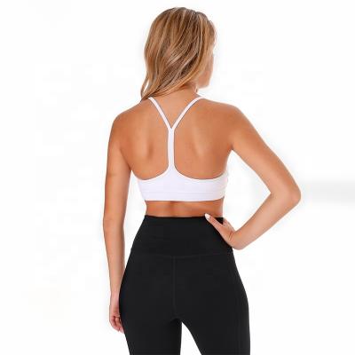 China Antibacterial Hot Sale Yoga Bra Mujer Sleeveless Gym Push Up Bra White Seamless Sports Bra for sale