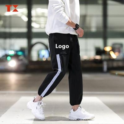 China Anti-pilling 2020 New Design Sportswear Black Casual Male Zipper Track Pants Nylon Custom Reflective Striped Men for sale