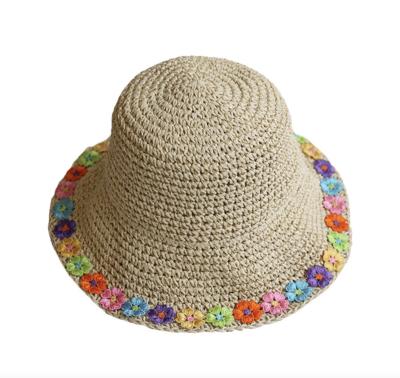 China Straw Summer Bucket Hat Straw Summer Bucket Hat Ladies Brown Color Image Women Sun Hat With Side Flower for sale