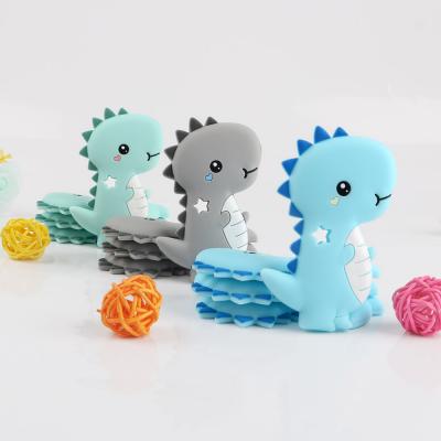 China 100% Food Grade Non-Toxic 2021 High Quality Teether Nurturing Soft Toy Cute Dinosaur Shape Food Grade Teethers Baby for sale