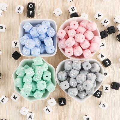 China Soft High Quality 12mm Printed Kovict BPA Free Tooth Beads Food Grade Milk Teeth Nipple Clip 12mm Silicone Chewable Letter Beads for sale