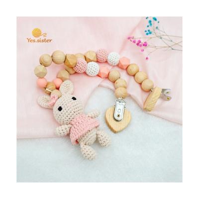 China Toy Hot Sales Lovely Handmade Soft Crochet Bunny Wooden Baby Stroller Hanging Pram Sensory Toy for sale