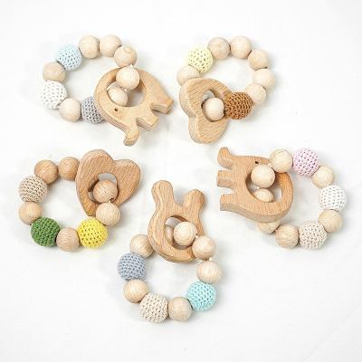 China Toy Kids Custom Unique Montessori Soft Wooden Wooden Beads Jigsaw Crochet Baby Teether for sale