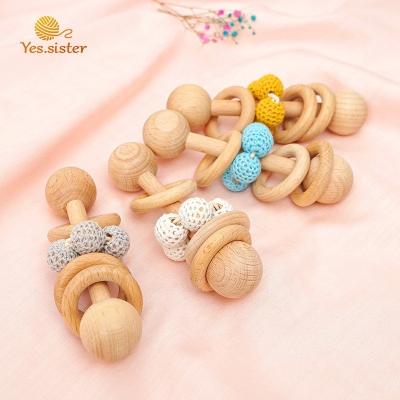 China Baby Soft Wooden Rattle from Toy Montessori Beech Wood Beads Ring Knitted Soft Teething Toy Bell for sale