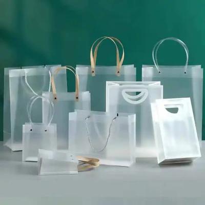 China Pp Plastic Clear Tote Gift Bag Pvc Package Transparent Christmas Gift Bag with Folding Style for sale