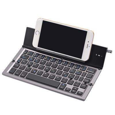 China Wireless Folding Handheld Wireless Keyboard, Portable Rechargeable BT Wireless Keyboard for 3 Systems for sale