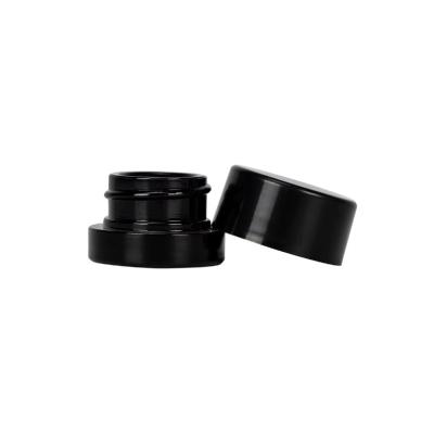 China Thick Black UV Protection Small Glass Jars With Lids 5ml Concentrate Jars for sale