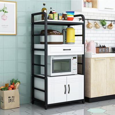 China Eco-friendly Durable Using Kitchen Storage Rack Metal Microwave Oven Shelf Rack Kitchen Utensil Storage Rack Cabinet for sale