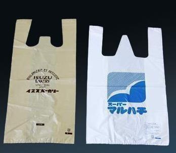 China Polybags plásticos del ultramarinos de los portatrajes de la camiseta durable de las compras en venta