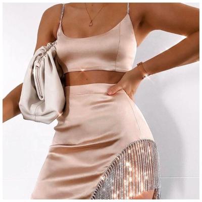 China Solid Color Asymmetrical Breathable Satin Mini Skirt And Top Set Sexy 2 Piece Skirt Set Women Night Club for sale