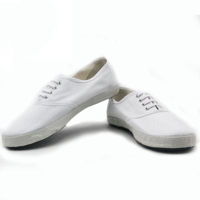 China Anti-Smell Wholesale Price Classic White Color Canvas Sport Shoes Women Men Track Shoes for sale