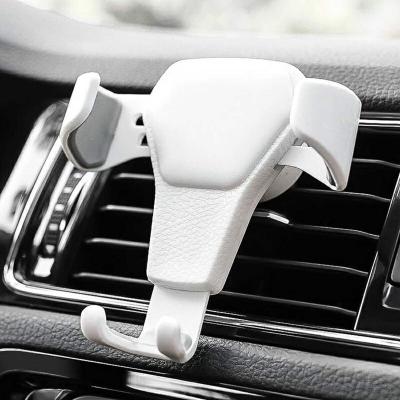 China Hot Selling 360-Degree Rotation Gravity Car Holder for Mobile Phone Air Vent Clip Mount Cell Holder GPS Smartphone Holder for sale