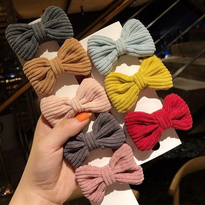 China Cute Bow Cuts 2019 Baby Hair Clip Fashion Girls Candy Color Winter Warm Bow Hair Cuts Cloth For Kids Child Headdress Accessories Bowknot Cute for sale