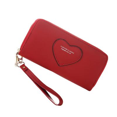 China New Solid Color Waterproof Double Zipper Women's Portable Female Belt Card Bag Coin Purse Love Clutch Purse Large Capacity for sale