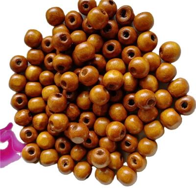 China DIY Wooden Creative Beads Wholesale Environmental Natural Wood Beads Decorative Round Wooden Beads Crafts DIY Jewelry Making Home Favor Holiday Decor for sale