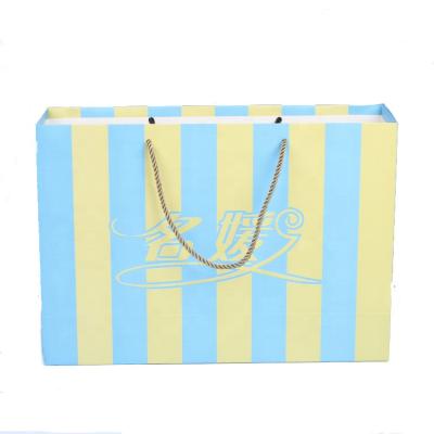 China Recyclable Wholesale Custom Printed Logo Kraft Gift Craft Shopping Paper Bag With Ribbon Handles for sale