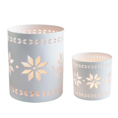 China New Design Eco-friendly Porcelain White Candle Holder Hollow Candle Cup For Decoration for sale