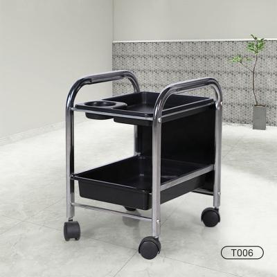 China 360 Degree Nail Spinned Beauty Spa Salon Equipment Furniture Pedicure Trolley Plastic Black Trolley With Wheels for sale