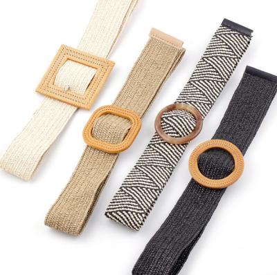 China Woven Elastic pp Straw Stretch Belt With Round Braided Woven Wide Wooden Buckle Female Female Strap Designer for sale